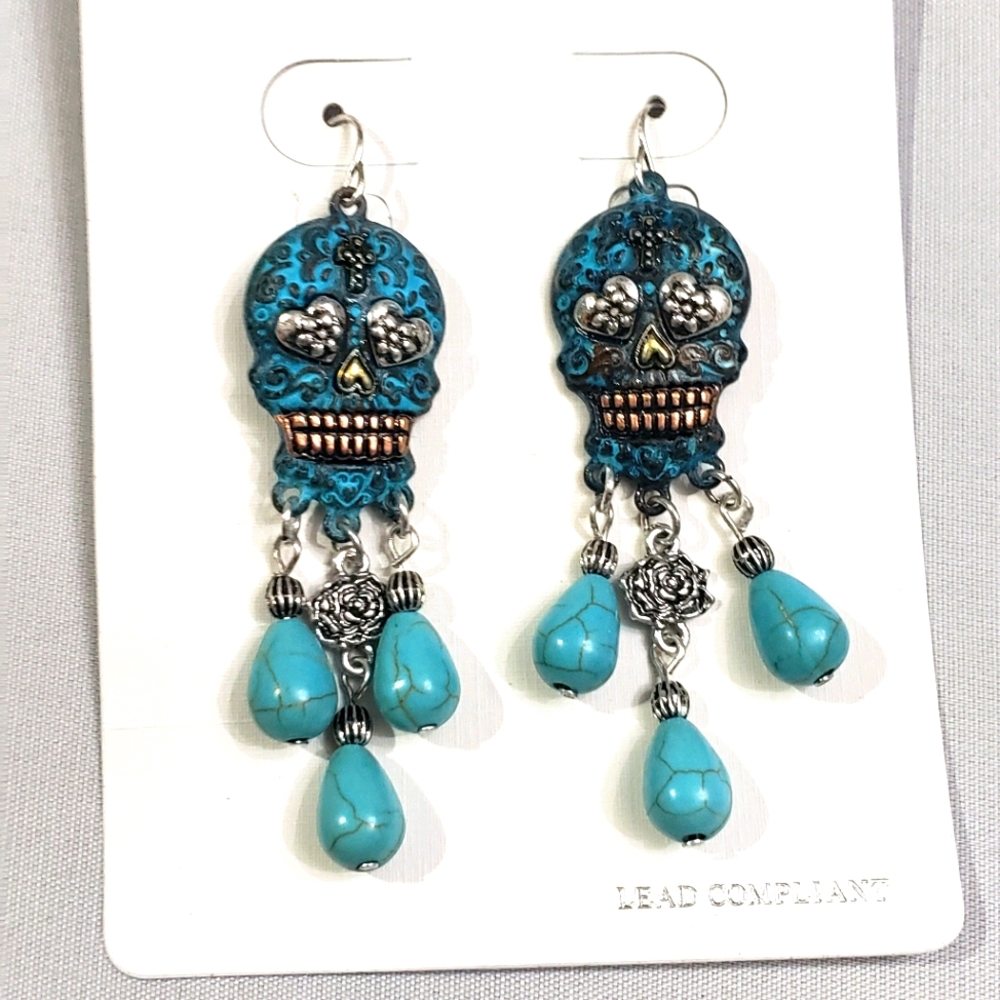 Skull turquoise color earrings